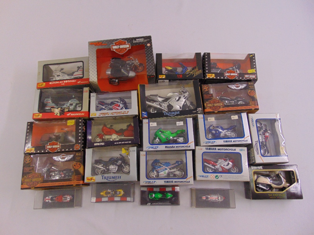 A quantity of diecast motorbikes to include Maisto, all in good condition and original packaging (