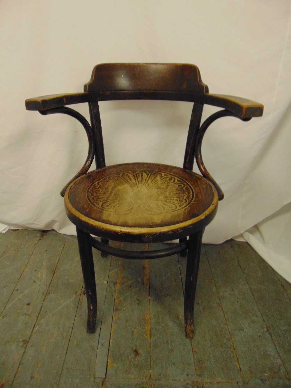 A 1930s Bentwood occasional armchair on four outswept legs