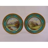 A pair of Minton cabinet plates with images of Balmoral Castle and Edinburgh Castle, marks to the