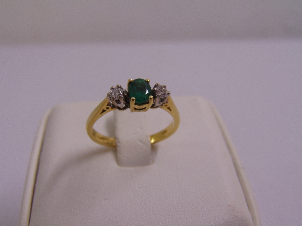 18ct yellow gold emerald and diamond three stone ring, approx total weight 2.9g