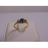 18ct yellow gold emerald and diamond three stone ring, approx total weight 2.9g