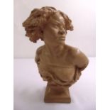 A ceramic bust of an African female from L’Atelier de Moutage du Louvre, (cast from the original)