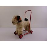 Triang baby push along dog with handle and four wheels, A/F