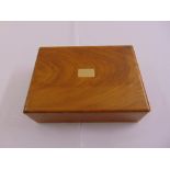A yew wood and cedar wood rectangular cigar humidor with hinged cover