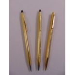 Two Cross ballpoint pens and an Eversharp gold plated propelling pencil