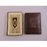 A leather embossed book of Jewish interest and another