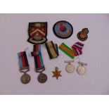 A quantity of military medals to include Northwest Frontier India attributed to 433E7786 Pte E.