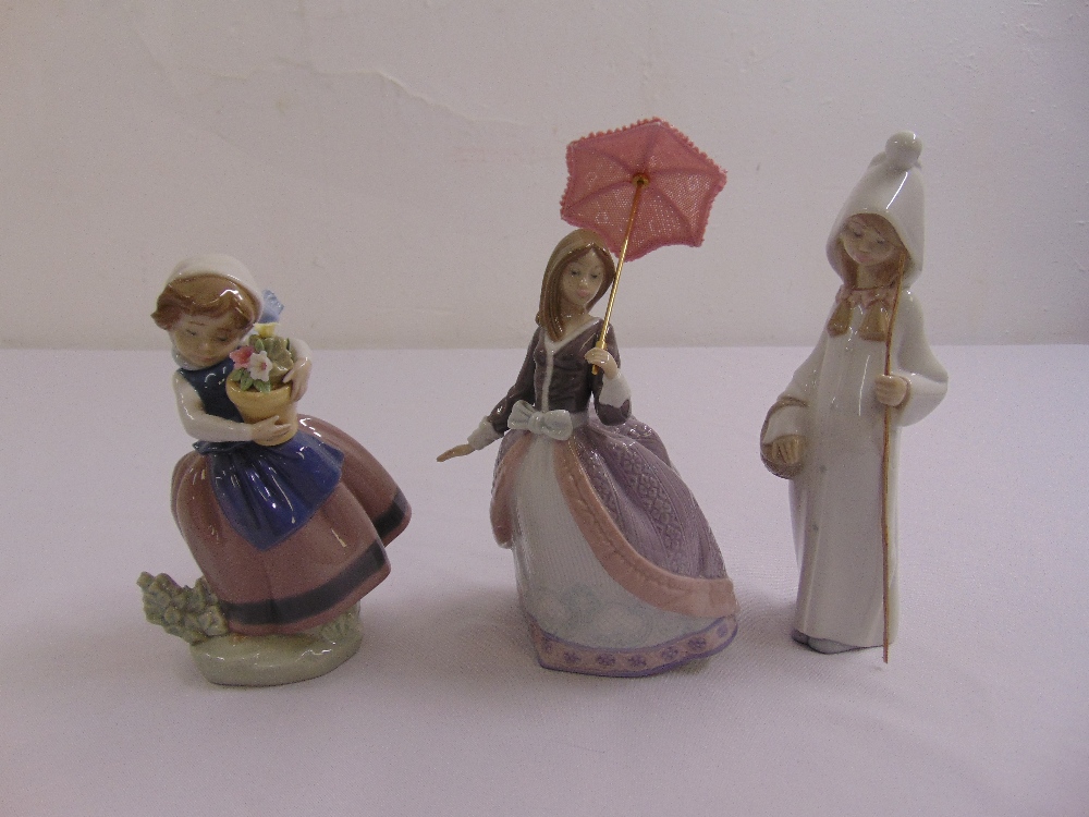 A quantity of Lladro figurines to include girl with a parasol, Bo Peep and girl with a basket