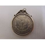 1889 Unites States Morgan silver dollar loose set in a pendant mount
