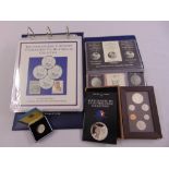 A quantity of USA coinage to include uncirculated half dollars, Olympic silver uncirculated