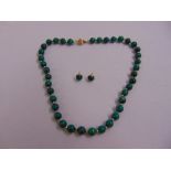 Malacite bead necklace with a 14ct yellow gold clasp and a pair of matching earrings