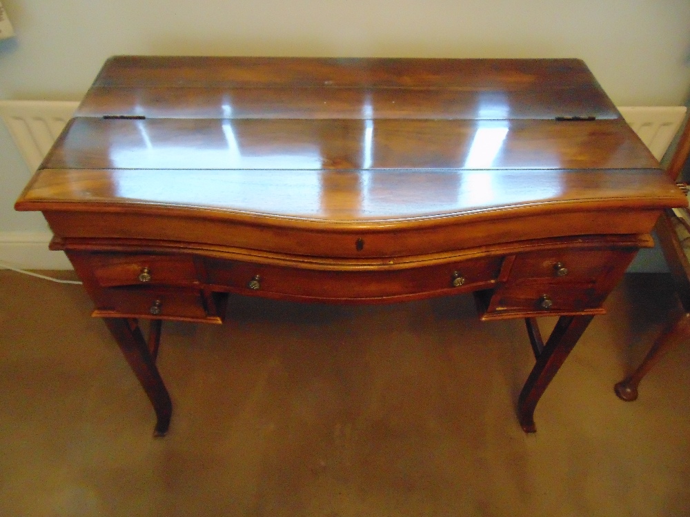 A 19th century rectangular mahogany rise and fall bow fronted desk, the rise and fall mechanism - Image 2 of 2