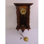 A mahogany and glass wall regulator, white enamel dial with Roman numerals, to include key and