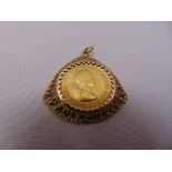 1966 gold sovereign mounted in a 9ct gold pendant, approx total weight 12.3g