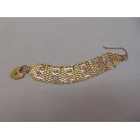 9ct yellow gold gatelink bracelet, approx total weight 32.4g