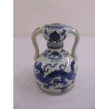 Chinese blue and white two handled stem vase decorated with a dragon, bats and flowers to the sides