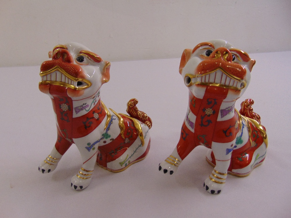 A pair of Herend Dogs of Foe figurines, marks to the base