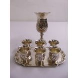 A quantity of white metal to include a Kiddush cup, a miniature tray and six beakers