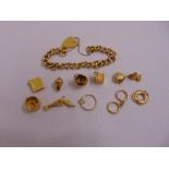 Ten 9ct gold charms approx total weight 17.8g, a 22ct gold ring approx total weight 1.4g and a