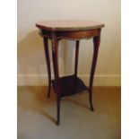A mahogany side table of shaped rectangular form with marble top and cabriole legs
