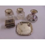 Two cut glass and silver mounted inkwells, a vase with overlaid silver, a filigree hinged box and