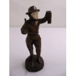 A bronze and ivory figurine by Omerth of a boy holding a lantern, A/F