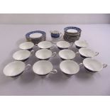 Wedgwood part tea set in blue and white to include cups, saucers, a sandwich plate and a cream