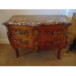 A French Louis XVI style commode of shaped rectangular form with two drawers and marble top