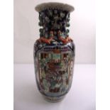 A Chinese cylindrical vase decorated with figures and naturalistic forms