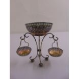 A silver plated table centrepiece scroll and bar pierced baskets supported by scrolling wirework
