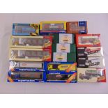 A quantity of Corgi diecast to include trucks and transporters, all in original packaging (16)