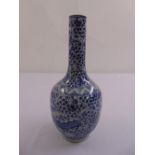 A Chinese blue and white baluster vase decorated with birds and flowers, mark to the base