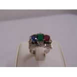 A white gold, sapphire, emerald, ruby and diamond Art Deco style ring, tested 14ct, approx total