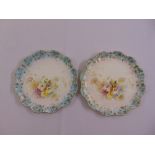 A pair of Royal Doulton hand painted cabinet plates