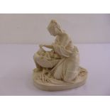 A Parianware figurine of a mother and baby on raised oval base, signed Albert Carrier