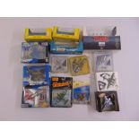 A quantity of diecast aeroplanes and boats, all in original packaging (15)