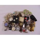 A quantity of costume jewellery to include rings, bracelets, necklaces and watches