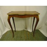 A rectangular Kingswood hall table with applied brass mounts on four cabriole legs