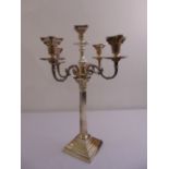 A Garrards silver plated five light candelabrum, Corinthian column form on stepped square base