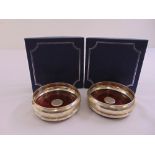 A pair of silver wine coasters in original fitted presentation boxes, Birmingham 2003