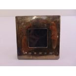 A square hallmarked silver mounted photograph frame