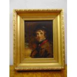 A framed and glazed late 19th century oil on panel of a young boy, 21.5 x 16.5cm