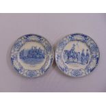 A pair of blue and white Constantine plates with military scenes to the centre A/F
