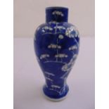 A Chinese blue and white prunus blossom baluster vase, character marks to the base