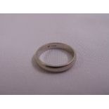 A platinum wedding band stamped 950, approx total weight 6.7g