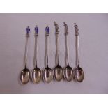 Six coffee spoons with figurine terminals, three enamelled, Sheffield 1917