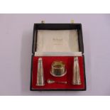 A cased silver condiment set to include salt, pepperette, mustard and condiment spoon, Birmingham