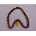 A Chinese horn bead necklace