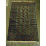 A Persian wool carpet blue ground with geometric repeating pattern and border, 175 x 130cm