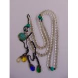 A rock crystal, malachite and semi precious stone necklace